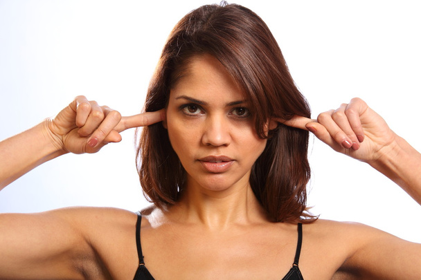 Woman fingers in ears not listening - Foto, immagini