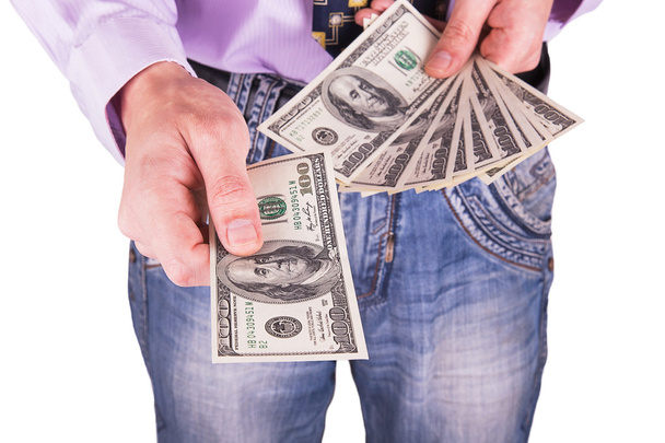 Man's hand reiken van geld - Foto, afbeelding