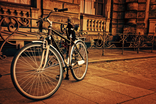 Vintage Bicycle Leaning against a Stone Wall - Photo, image