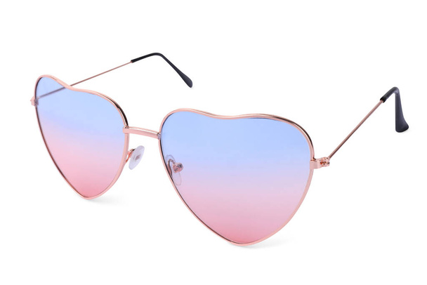 Stylish heart shaped sunglasses isolated on white. Fashion accessory - 写真・画像