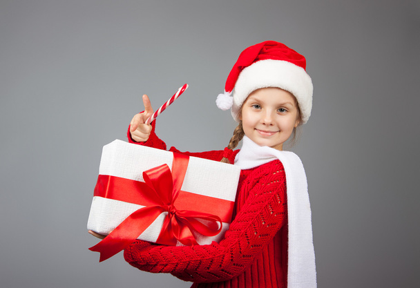 Happy girl with Christmas present - Zdjęcie, obraz