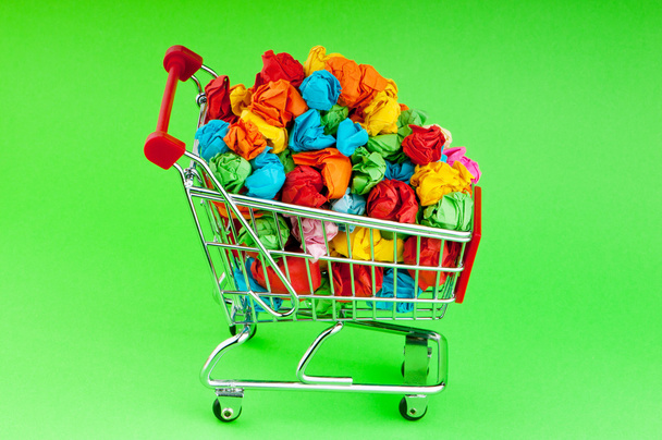 Recylcing concept with color paper and shopping cart - Φωτογραφία, εικόνα
