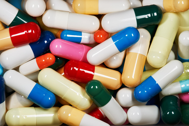 многоцветные лекарственные капсулы
 - Фото, изображение