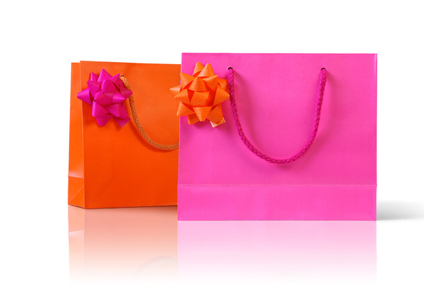 Rosa y bolsas de color naranja
 - Foto, Imagen