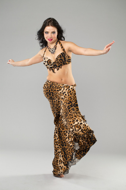 Young sexy woman in leopard dance costumes  - Φωτογραφία, εικόνα