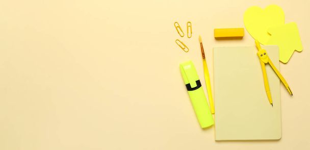 School stationery on beige background with space for text, top view - Foto, Imagem