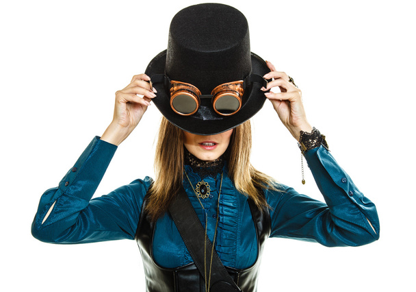Woman covering part of her face with hat - Foto, Imagen