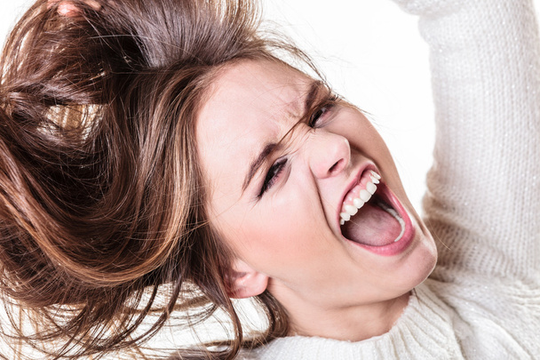 Woman screaming and pulling messy hair - Φωτογραφία, εικόνα