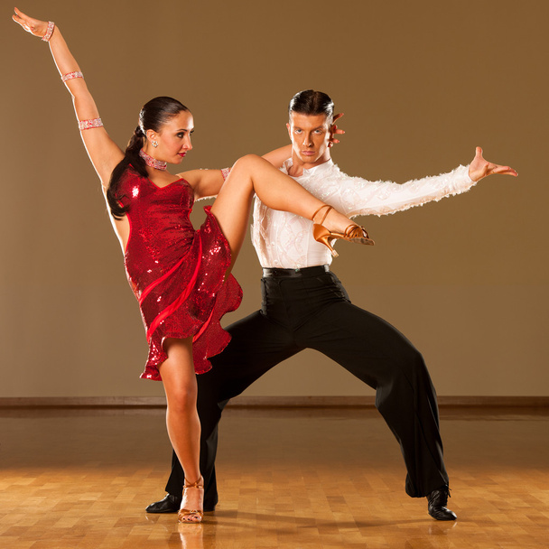 latino dance couple in action - dancing wild samba  - Foto, Bild
