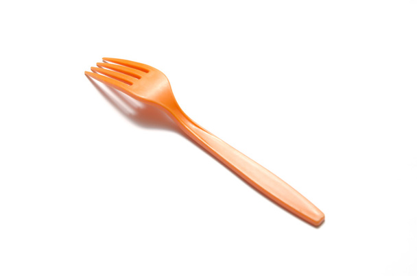 orange plastic fork - Foto, imagen