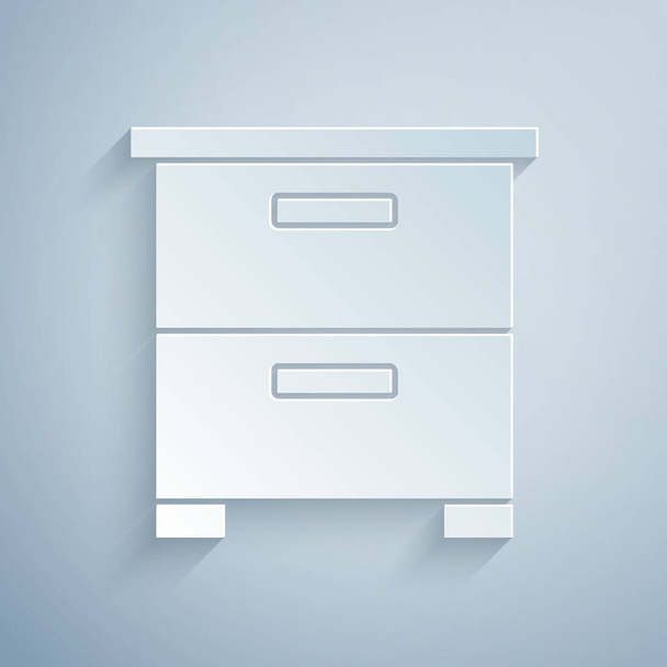 Paper cut Furniture nightstand icon isolated on grey background. Paper art style. Vector. - Vector, Imagen