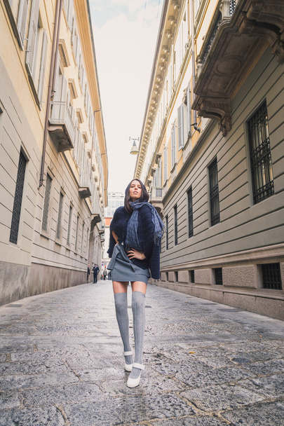 Beautiful girl posing in the city streets - Valokuva, kuva