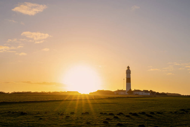 Panoramic image of Kampen lighthouse against sky, Sylt, North Frisia, Germany  - Photo, Image