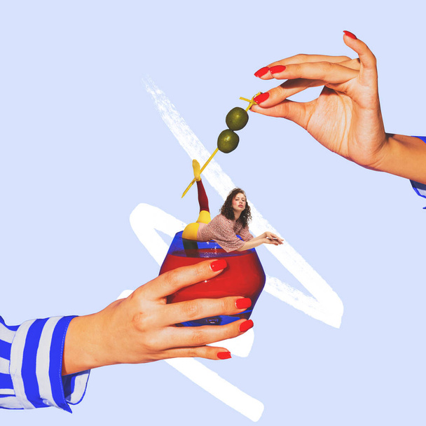 Contemporary art collage. Hands and woman falling into bloody mary cocktail isolated over light blue background. Concept of alcohol, addiction, party, taste. Pop art style. Copy space for ad - Φωτογραφία, εικόνα
