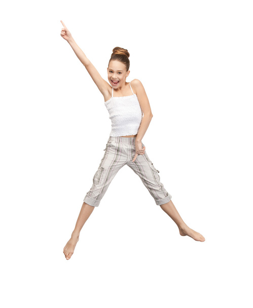 Jumping teenage girl - Fotó, kép