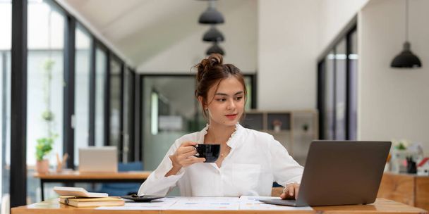 Portrait of charming successful cheerful asian girl working remotely creating finance it presentation report at home house indoor. - Fotoğraf, Görsel