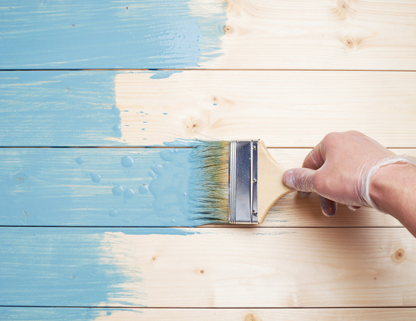 Process of painting wooden boards - 写真・画像