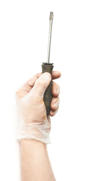 Hand holding screwdriver - Foto, imagen