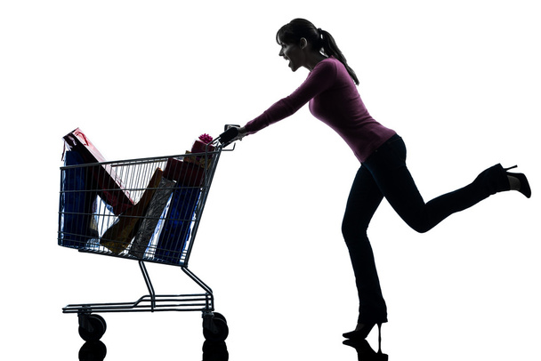 woman with full shopping cart silhouette - Foto, Imagem