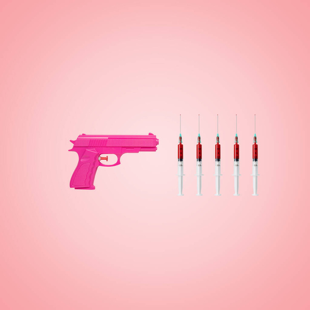 Creative backdrop made with pink handgun and syringes. Minimal pandemic concept. - Fotoğraf, Görsel