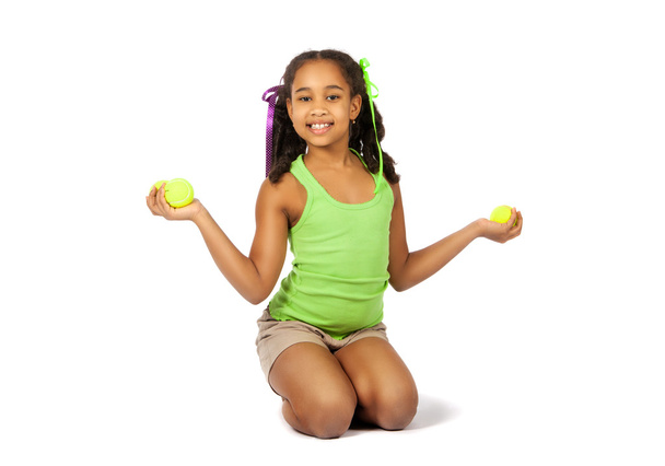 Girl with tennis balls - Foto, imagen