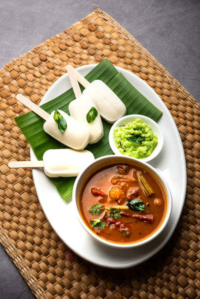 Idly lollipop or idli candy with stick served with sambar and chutney,South indian breakfast - Foto, Imagem