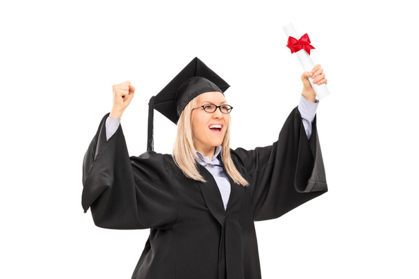 Delighted female student celebrating graduation - Фото, зображення
