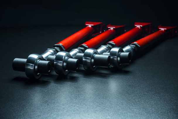 suspension levers custom for sports cars red in powder paint - 写真・画像