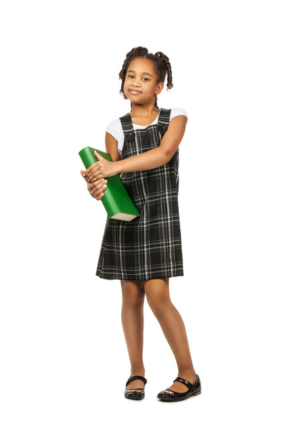 smart girl with big green book is standing on a white background - Fotó, kép