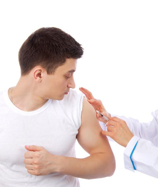 Doctor make flu vaccination or insulin injection - Foto, imagen