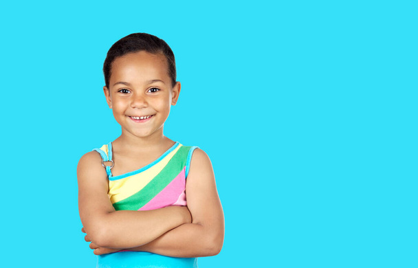Happy african beautiful child isolated on a blue background - Φωτογραφία, εικόνα