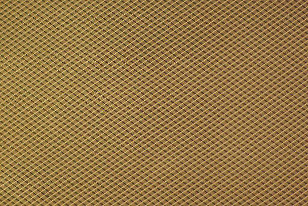 The black line contrasts with the yellow line as a grid on the gold background obtained by the manipulation. - Foto, Bild