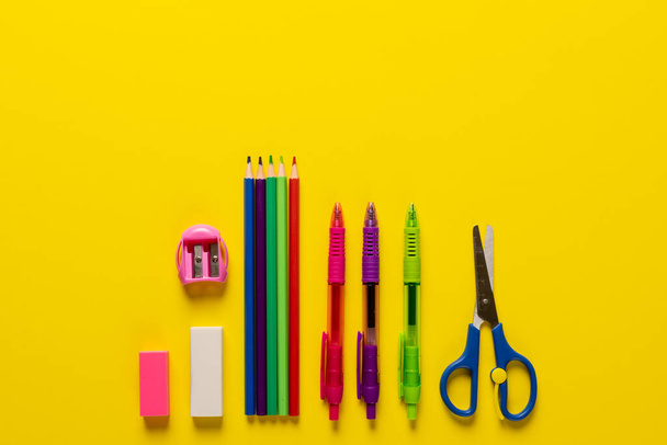 Image of school drawing tools on yellow surface with copy space. School equipment, tools, learning and education concept. - Fotó, kép