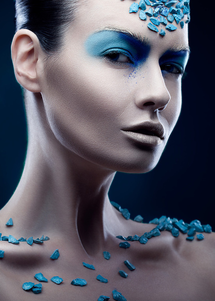 Pretty woman with blue stones - Foto, Imagem