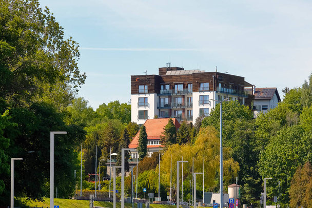 Gdynia, Poland - May 23, 2022: Buildings, hotels, a lot of lush greenery are in close proximity to the famous boulevard at the Gdansk Bay, what can be seen here  - Zdjęcie, obraz