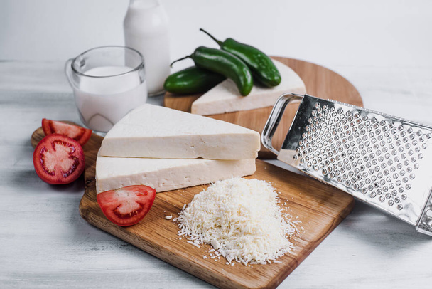 Mexican white Cotija cheese with fresh ingredients in Mexico Latin America - Foto, immagini
