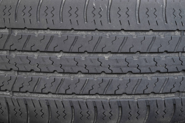 Closeup of a nicely aged tire. - Zdjęcie, obraz