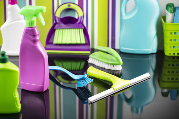 House  and office cleaning products. Colorful cleaning kit on striped color background. - Foto, imagen