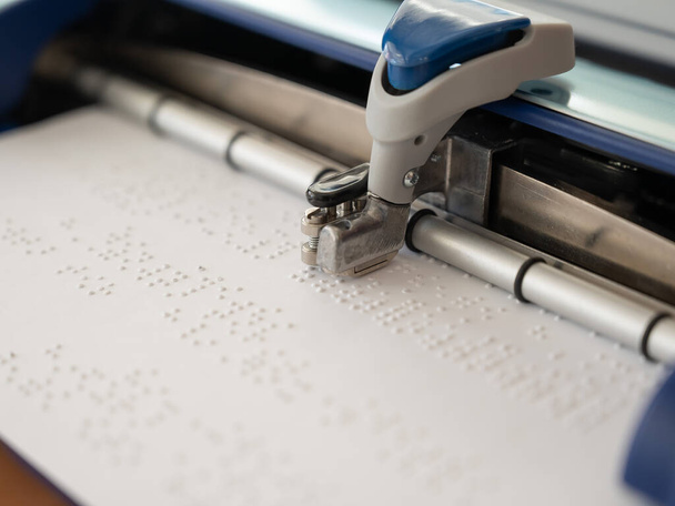 Close-up of a braille code printing machine - Zdjęcie, obraz