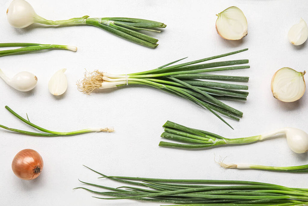 Composition with fresh green onion on light background - Photo, Image