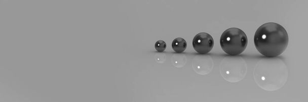 five balls of different sizes on a gray background. the concept of growth in anything. profit increase. Banner for insertion into site. Place for text cope space. 3d image.3d rendering. - Foto, Imagen