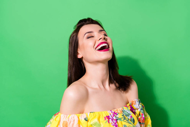 Portrait of pretty cheerful girl closed eyes toothy smile laughing good mood isolated on green color background. - Foto, Imagem