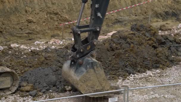 Construction works - Soil removal with a Excavator - Materiał filmowy, wideo