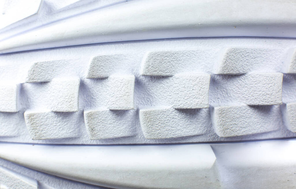 Modern sneakers  White leather trainers on big sole with spikes. Close up. - Photo, image