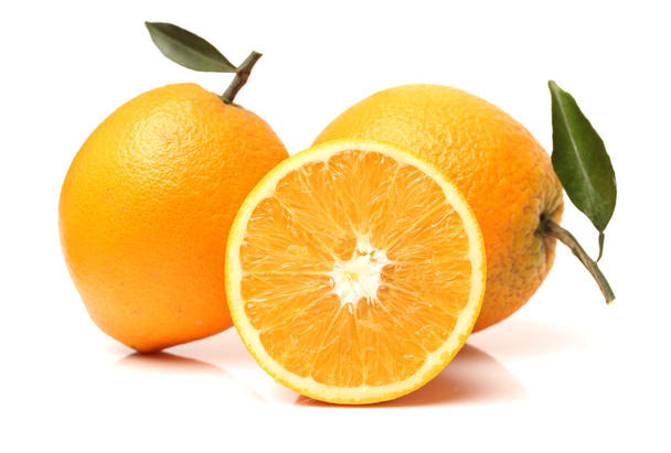 Fresh juicy oranges with leafs - Foto, Imagen