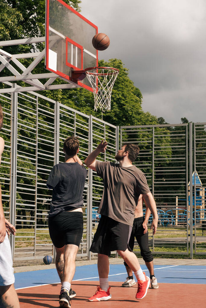 big strong basketball player outdoors court - Photo, image