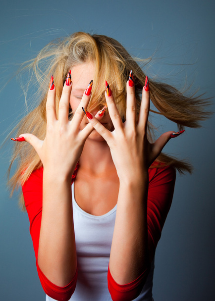 Girl with fashionable design of nails - Photo, image