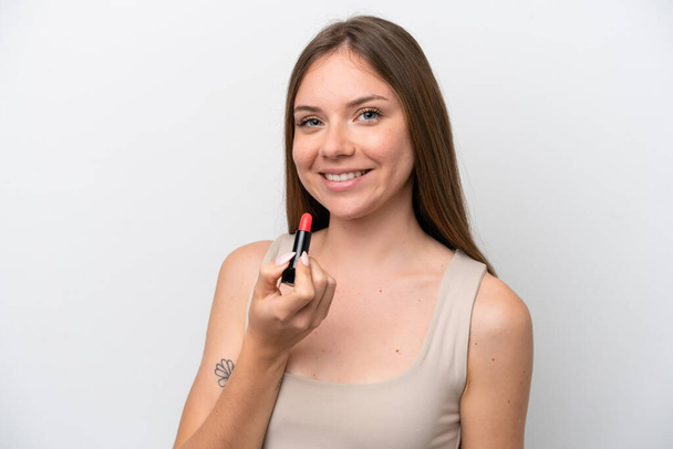 Junge Litauerin isoliert auf weißem Hintergrund mit rotem Lippenstift - Foto, Bild