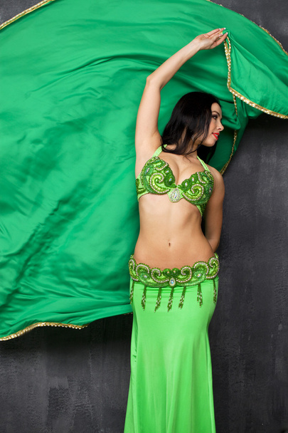 Young pretty woman in green indian dress - Photo, image
