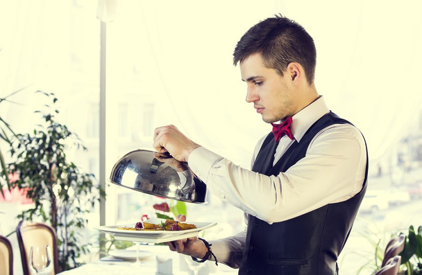 Waiter with tray of food - Φωτογραφία, εικόνα